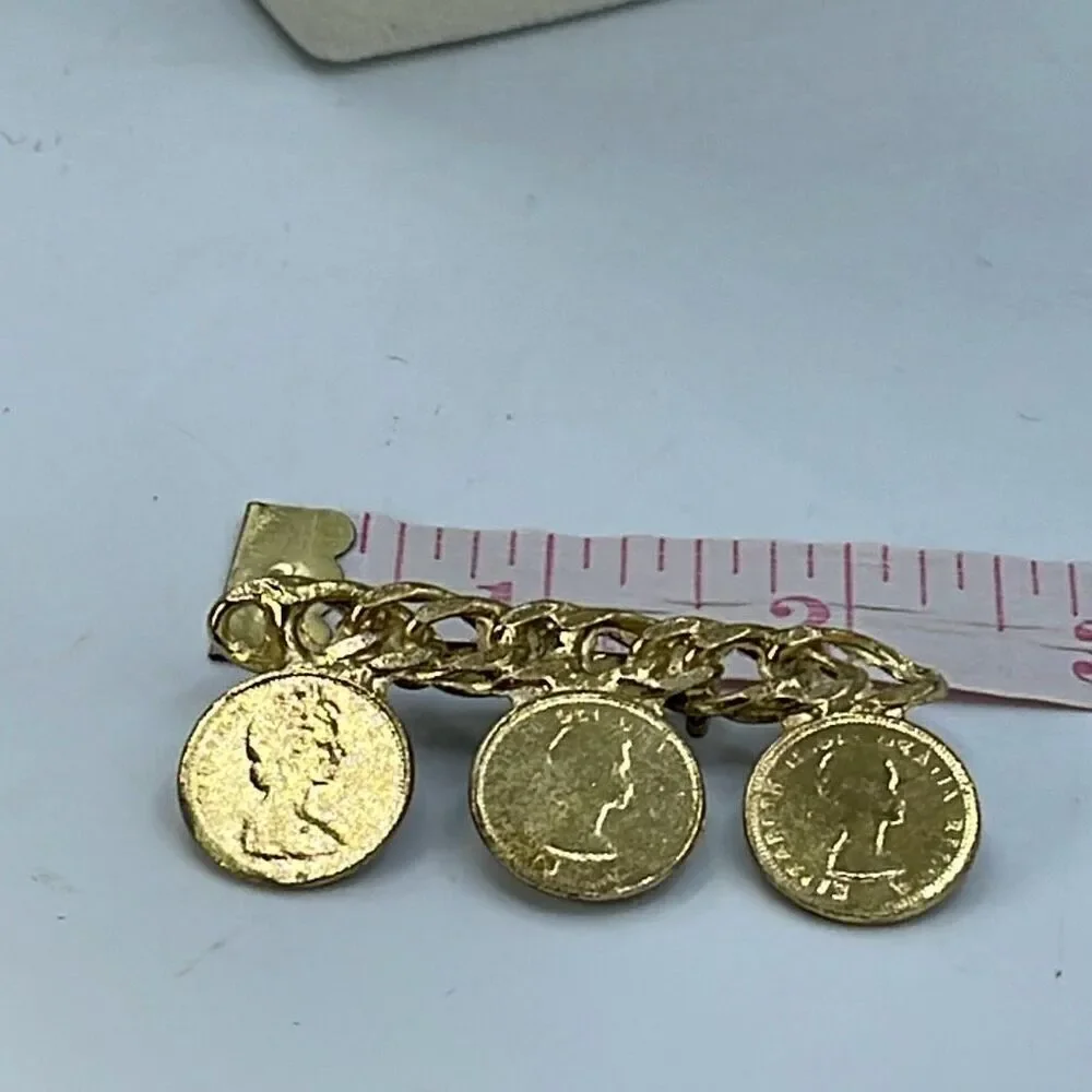 Vintage chain link  Elizabeth II faux coin brooch.